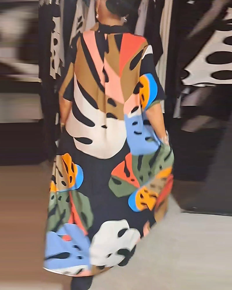 Lang kjole med stort bladmotiv