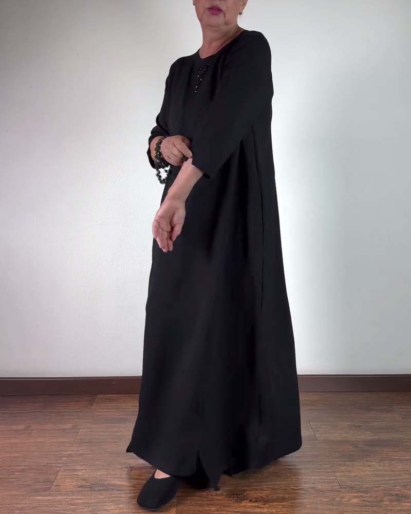 Sort løs kjole med rund hals
