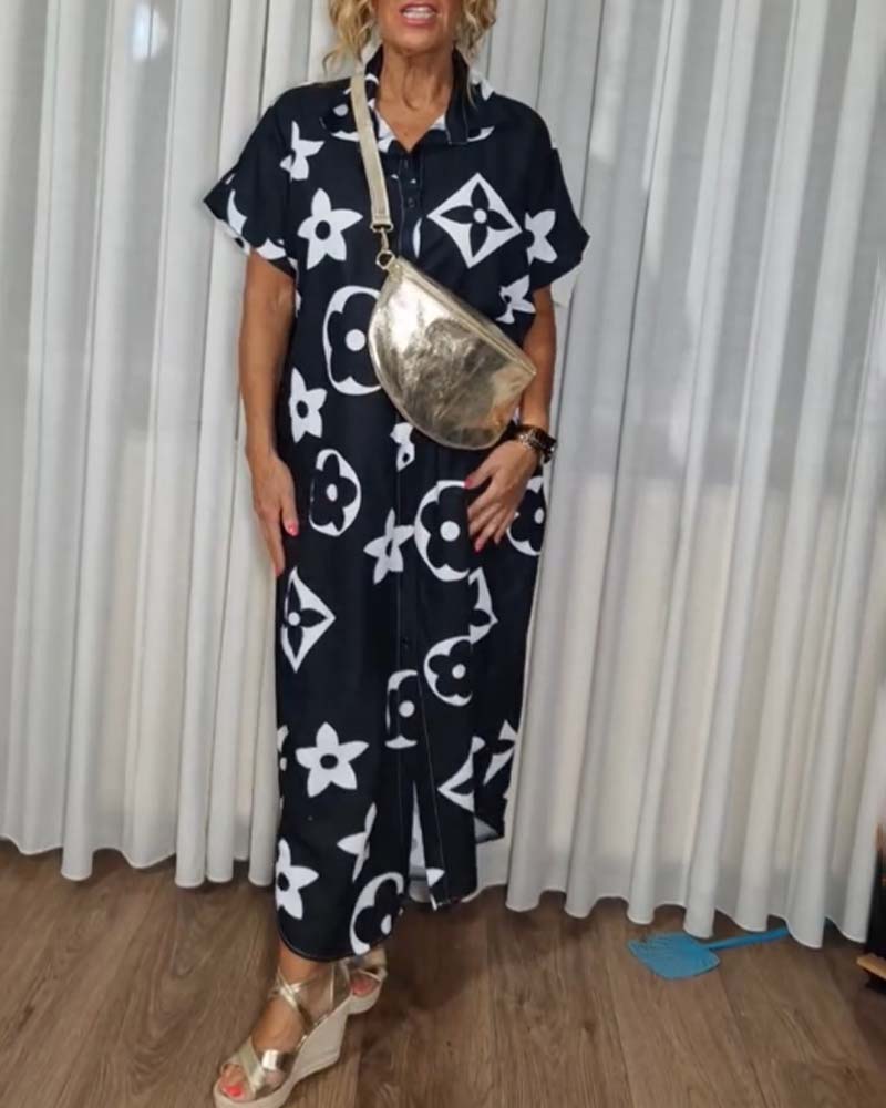 Sort kjole med reverskrave og monogram print