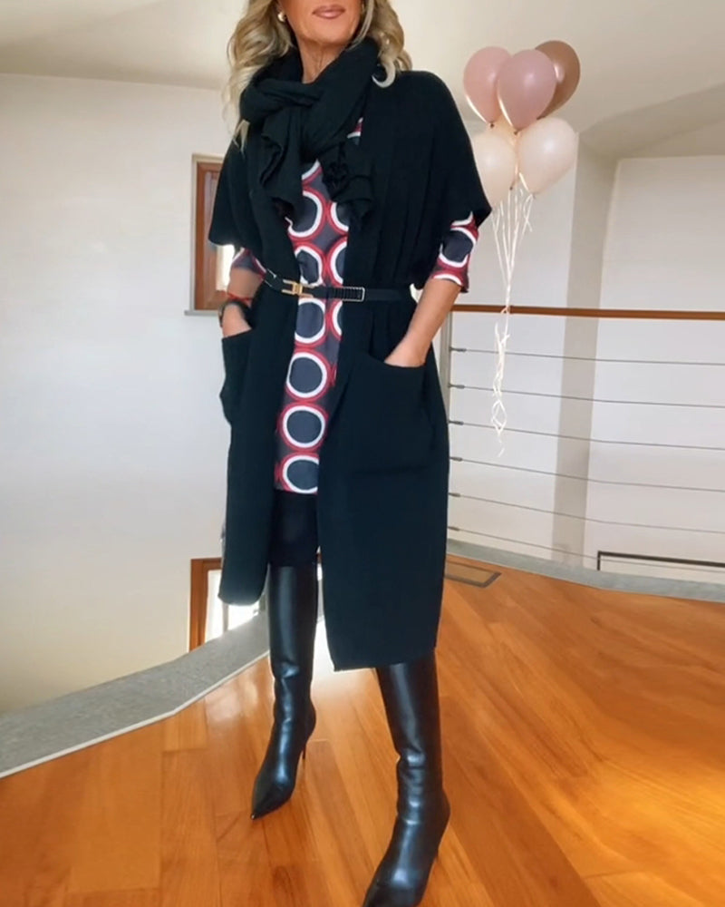 Lang sort cardigan med lommer og halve ærmer