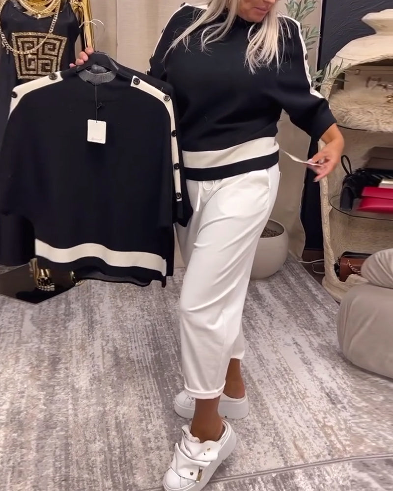 Sort sweater med hvid stribekant