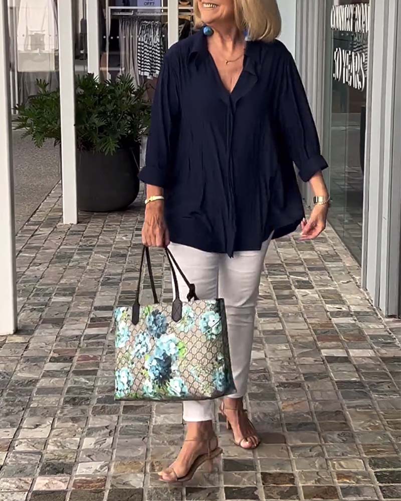 Mørkeblå bluse i løs pasform