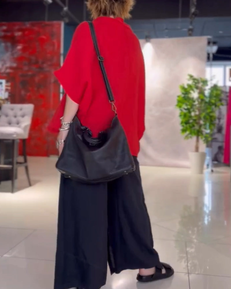 Ensfarvet top i løs pasform