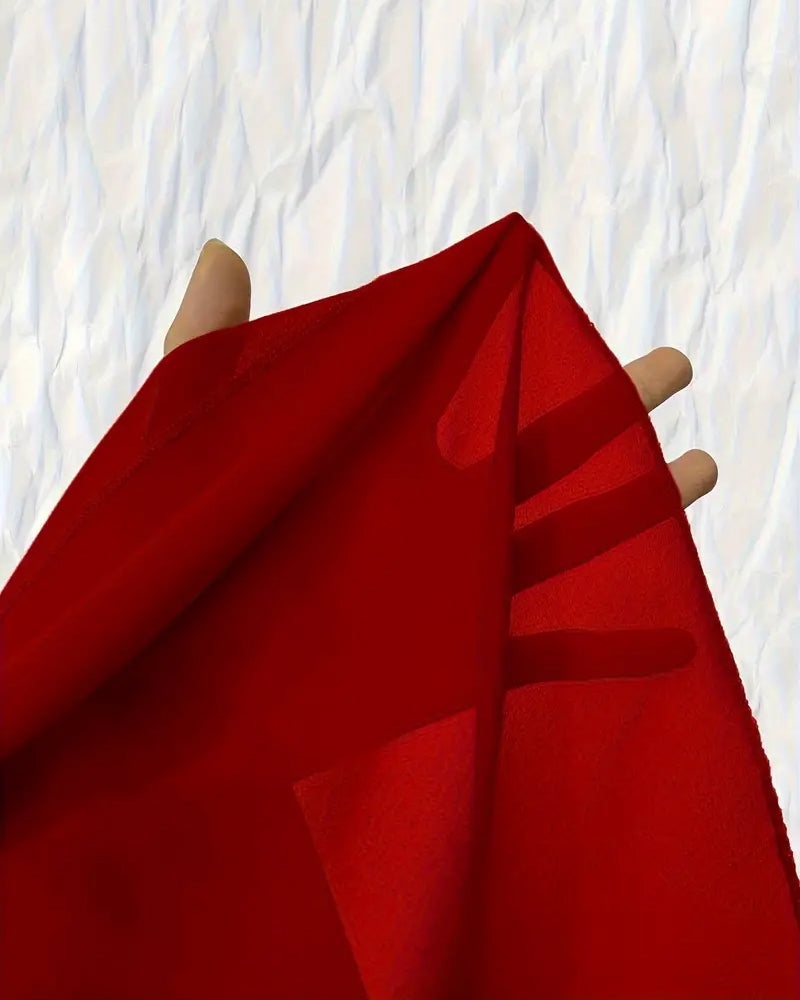 Top med flagermusærmer og rund hals