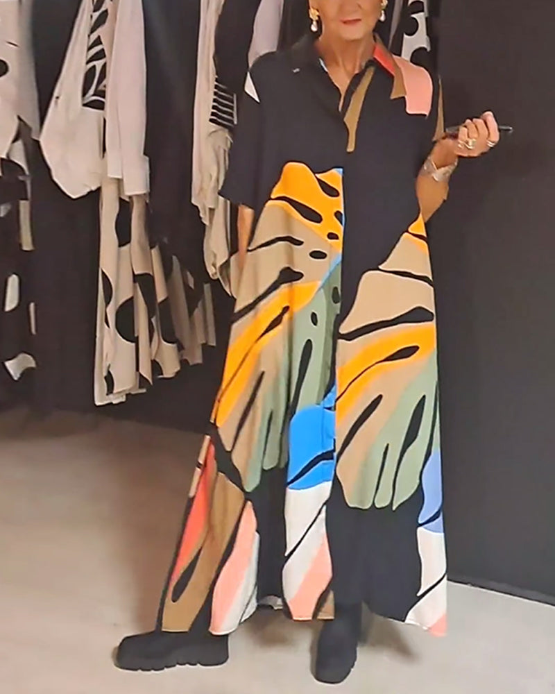 Lang kjole med stort bladmotiv