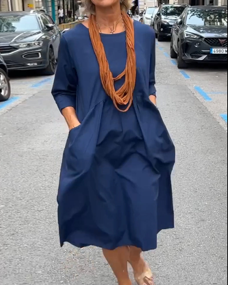 Rund hals kjole med lommer