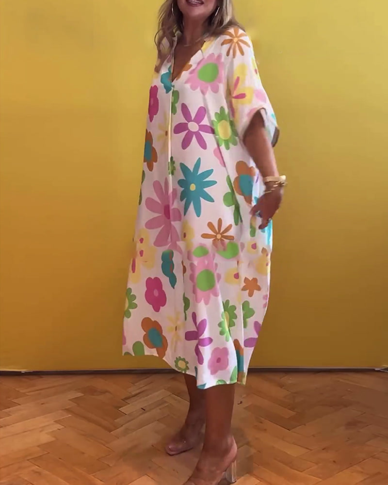 Sød blomsterkjole i løs pasform