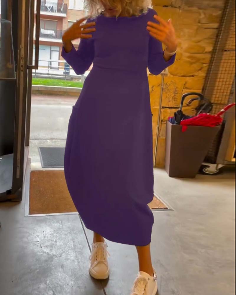 Langærmet sort kjole med lommer