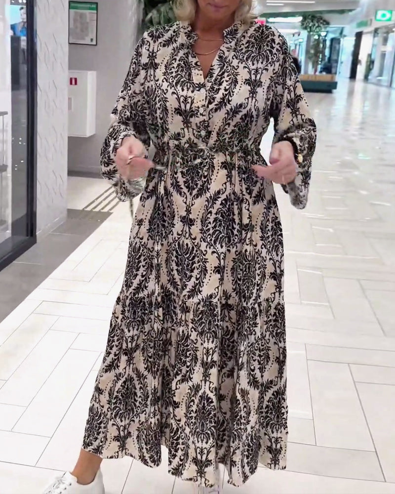 Mønstret kjole med klokkeærmer og snøre