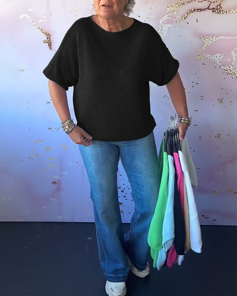 Løs ensfarvet pullover med rund hals