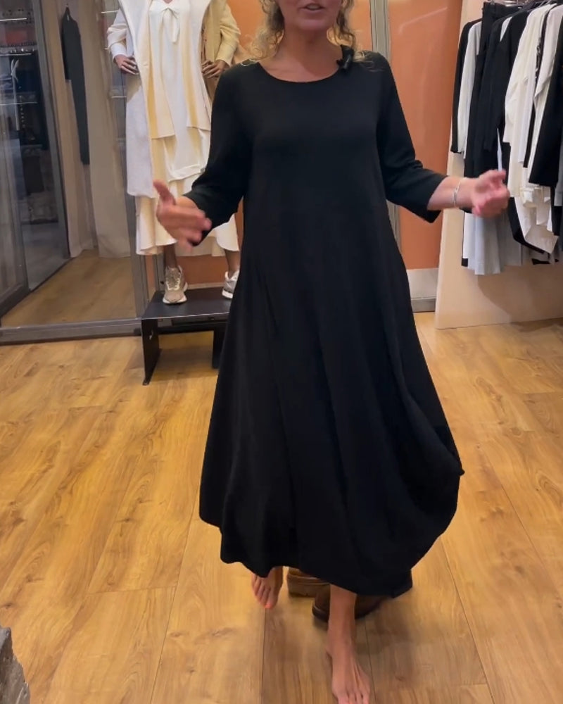 Lang kjole med lange ærmer og rund hals