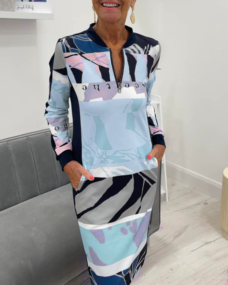 Langærmet kjole med farveblok og lynlås