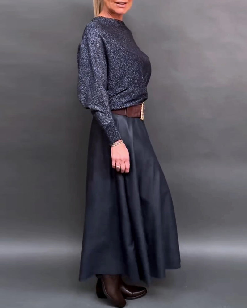 Skinnende top med rund hals og dolmanærmer