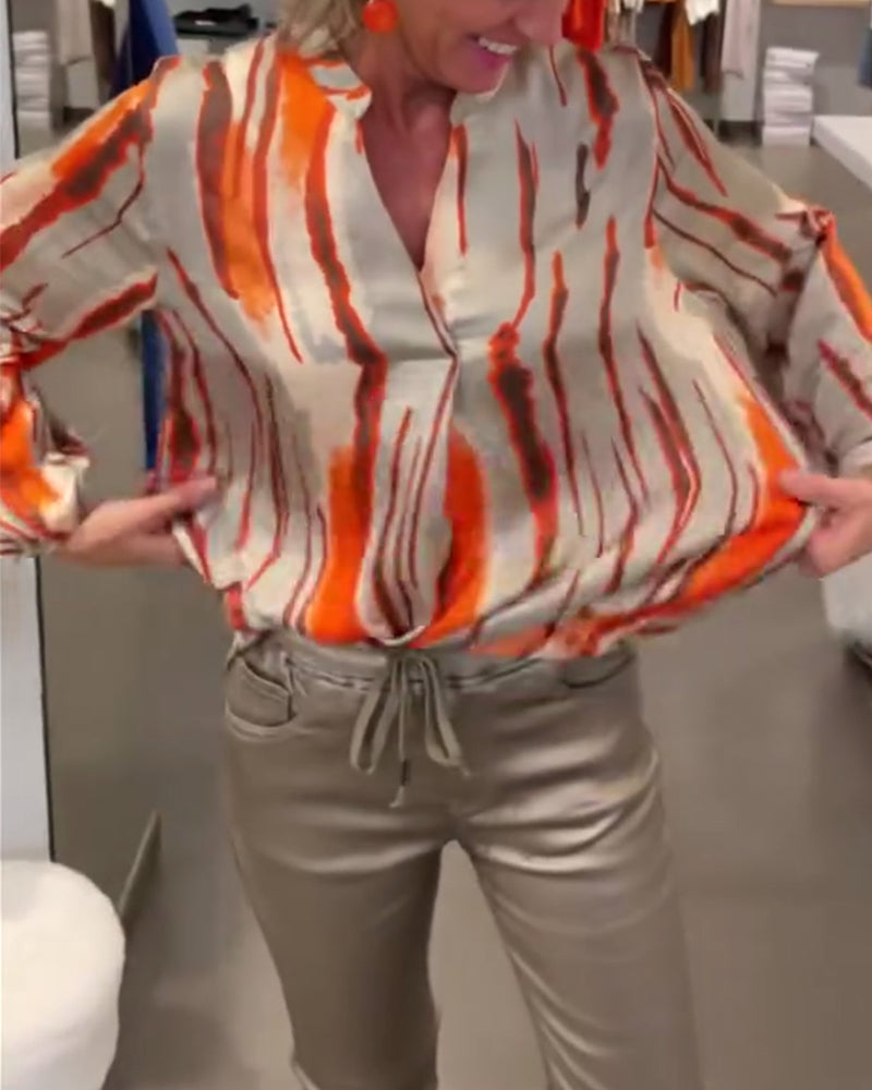 Langærmet bluse med stribet print