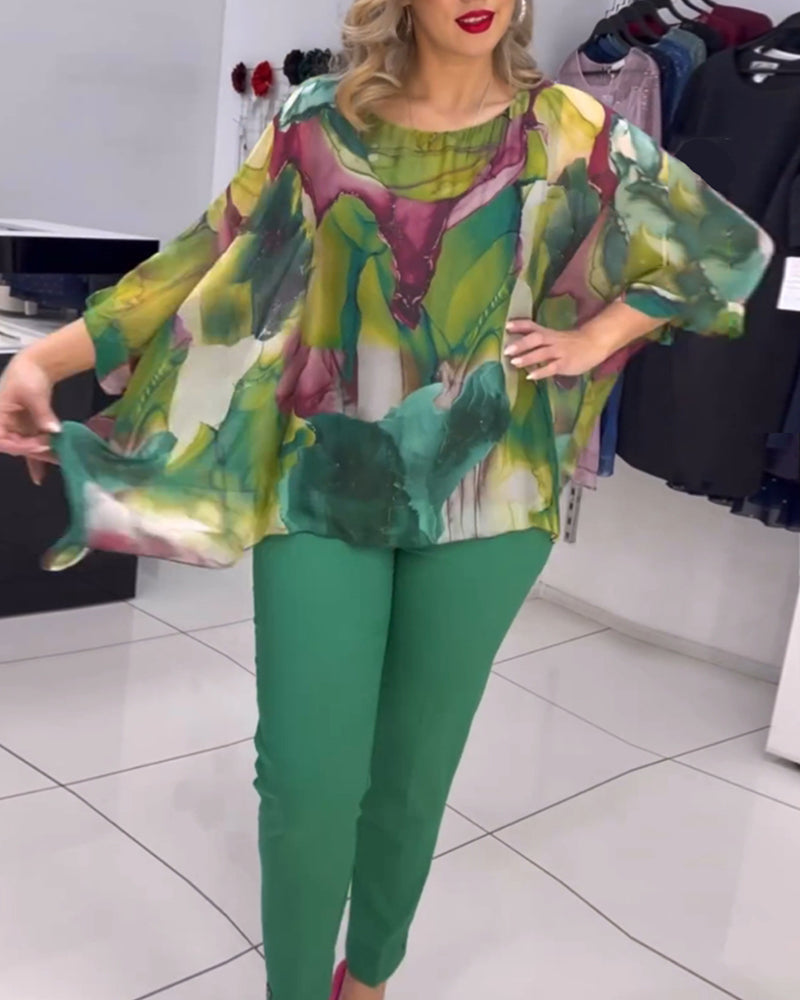 Rundhalset bluse med print og flagermusærmer