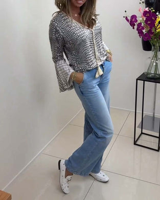 Bluse med frynser og vide ærmer