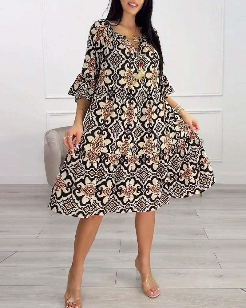 Knælang kjole med vintageprint