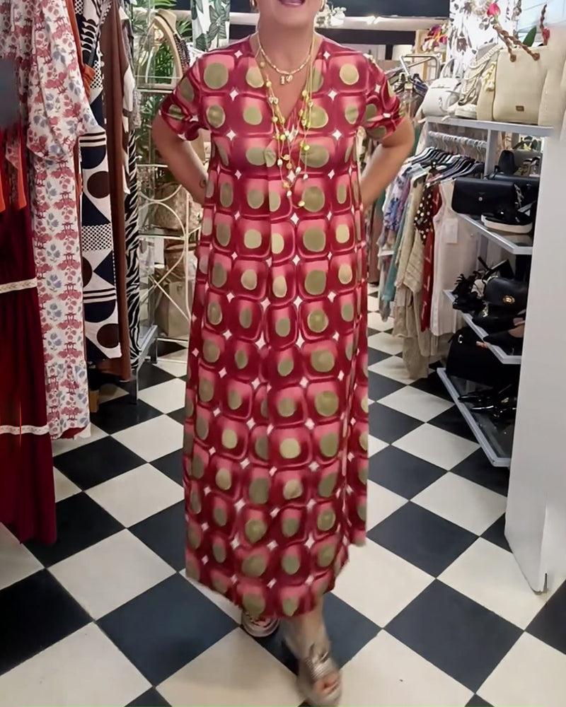 Kjole med afslappet kortærmet print og v-hals