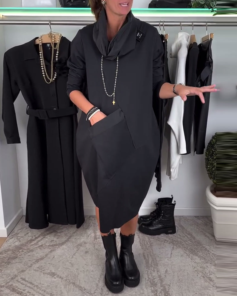 Sort patchwork kjole med stor forlomme