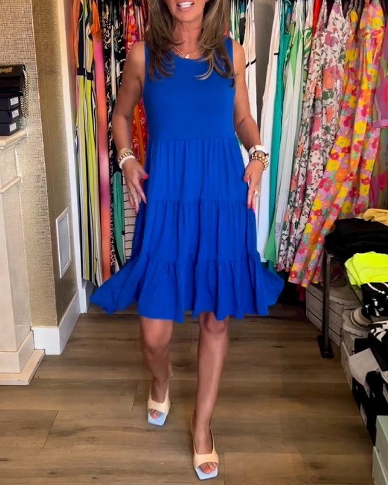 Blå ærmeløs kjole med plisseret nederdel
