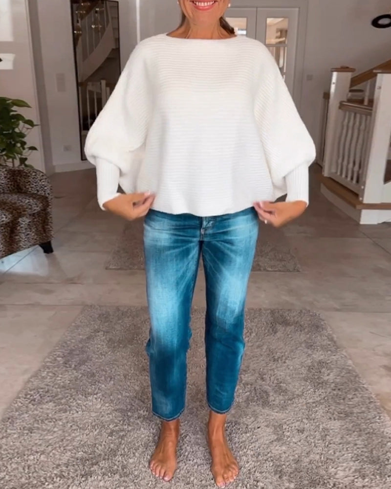 Ensfarvet sweater med lanterneærmer