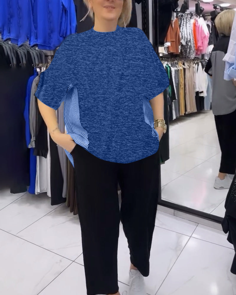 Afslappet sort bluse med nålestribet ryg