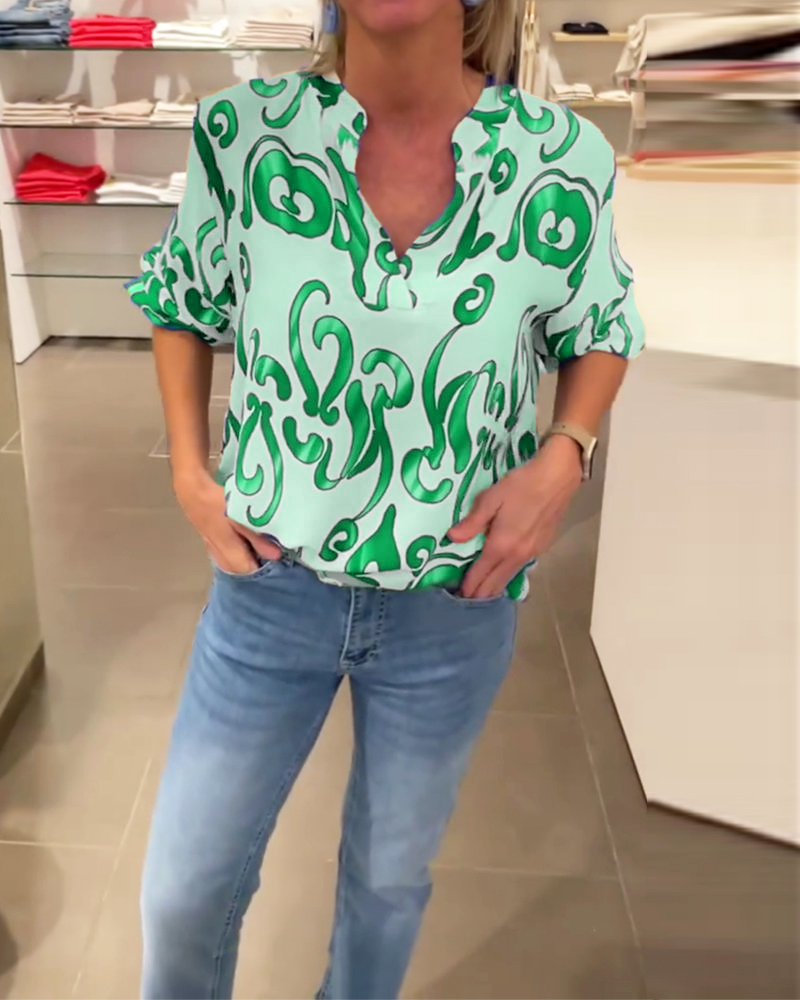 Elegant V-halset top med print