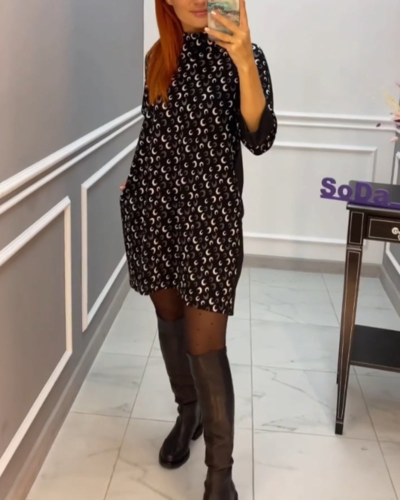 Afslappet sommerfugl kjole med print