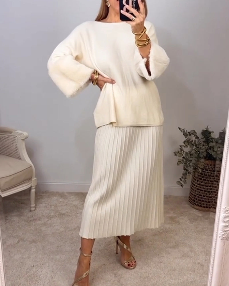 Elegant hvid sweater med plysmanchetter