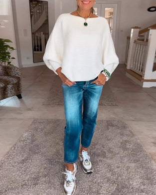 Ensfarvet sweater med lanterneærmer