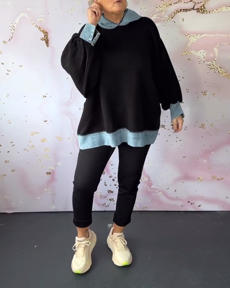 Afslappet hættetrøje med kontrastfarvede kanter