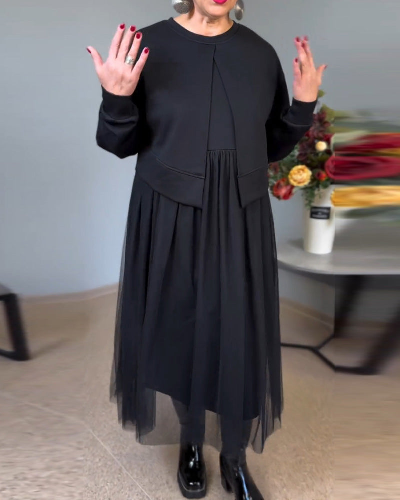 Elegant kjole med gennemsigtigt yderlag