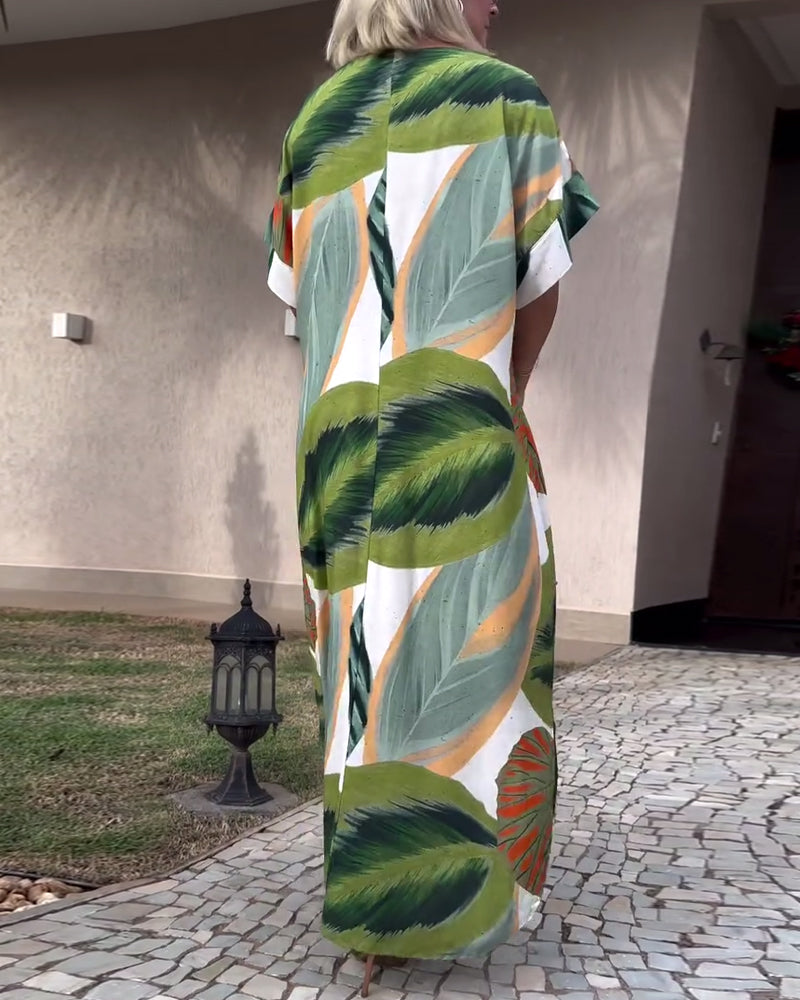 Afslappet kjole med korte ærmer og botanisk print