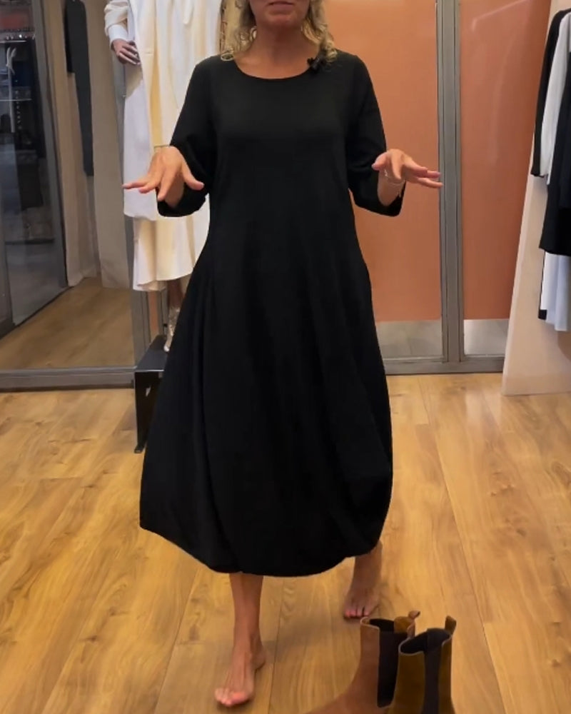 Lang kjole med lange ærmer og rund hals