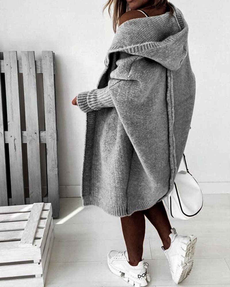 Oversized ensfarvet frakke