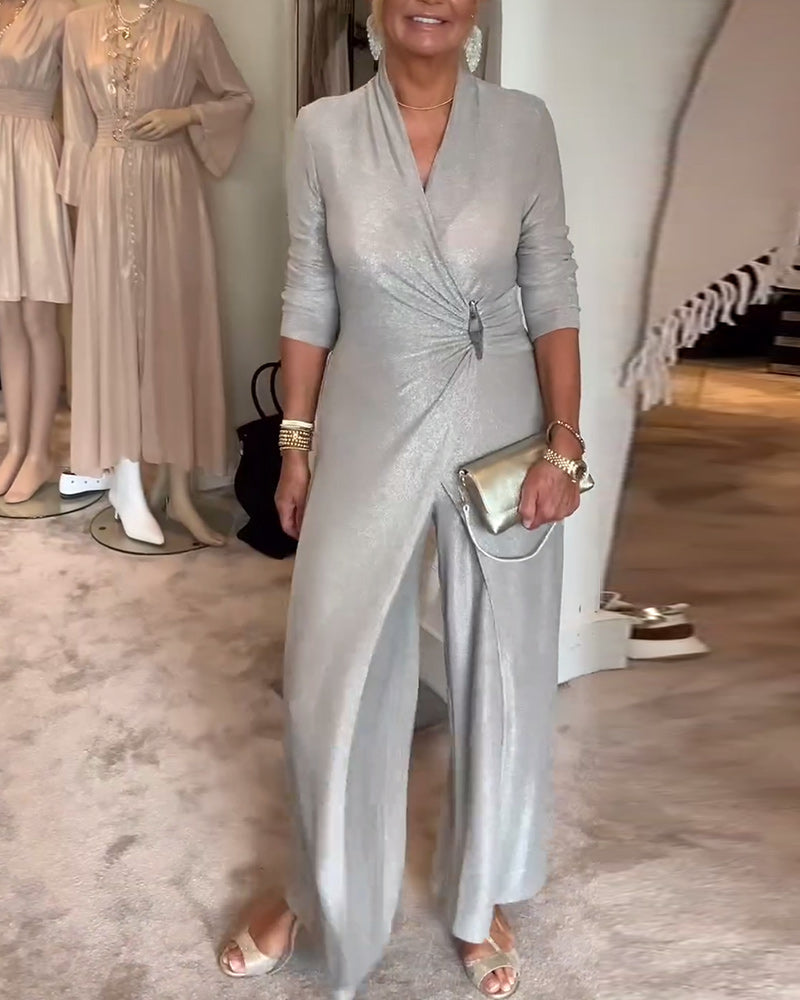 Elegant plisseret sølvfarvet jumpsuit