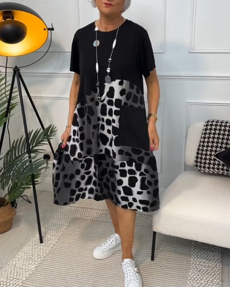 Sort patchwork kjole med rund halsudskæring