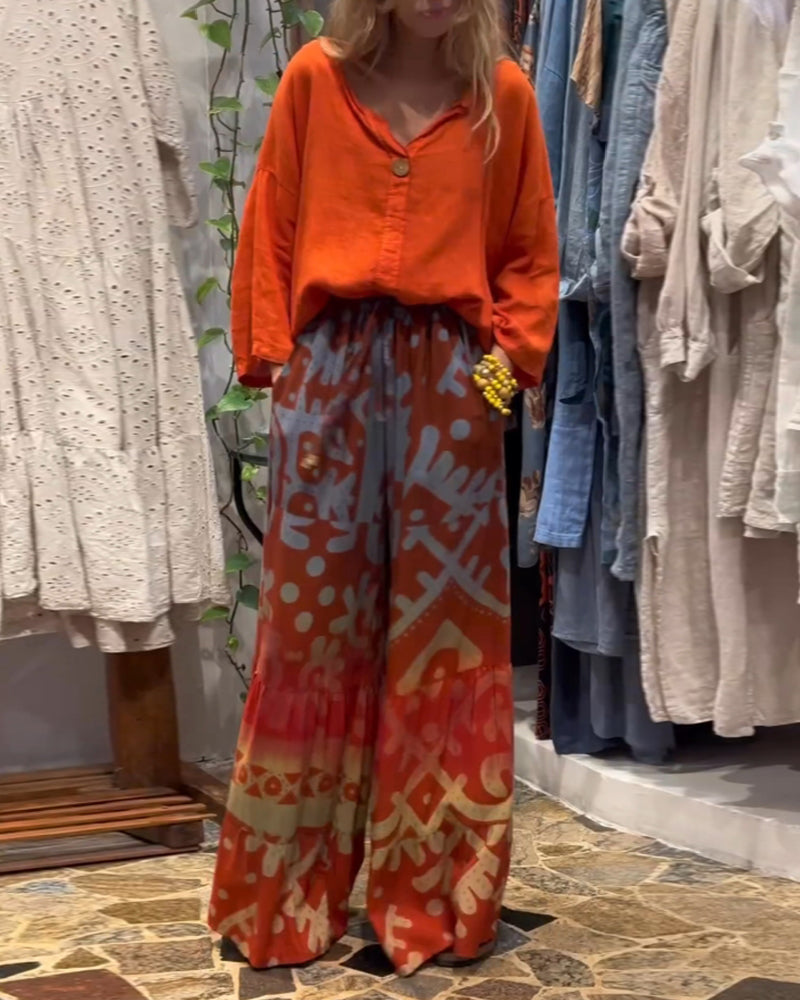 Bredbenede bukser i løs pasform med lommer og print