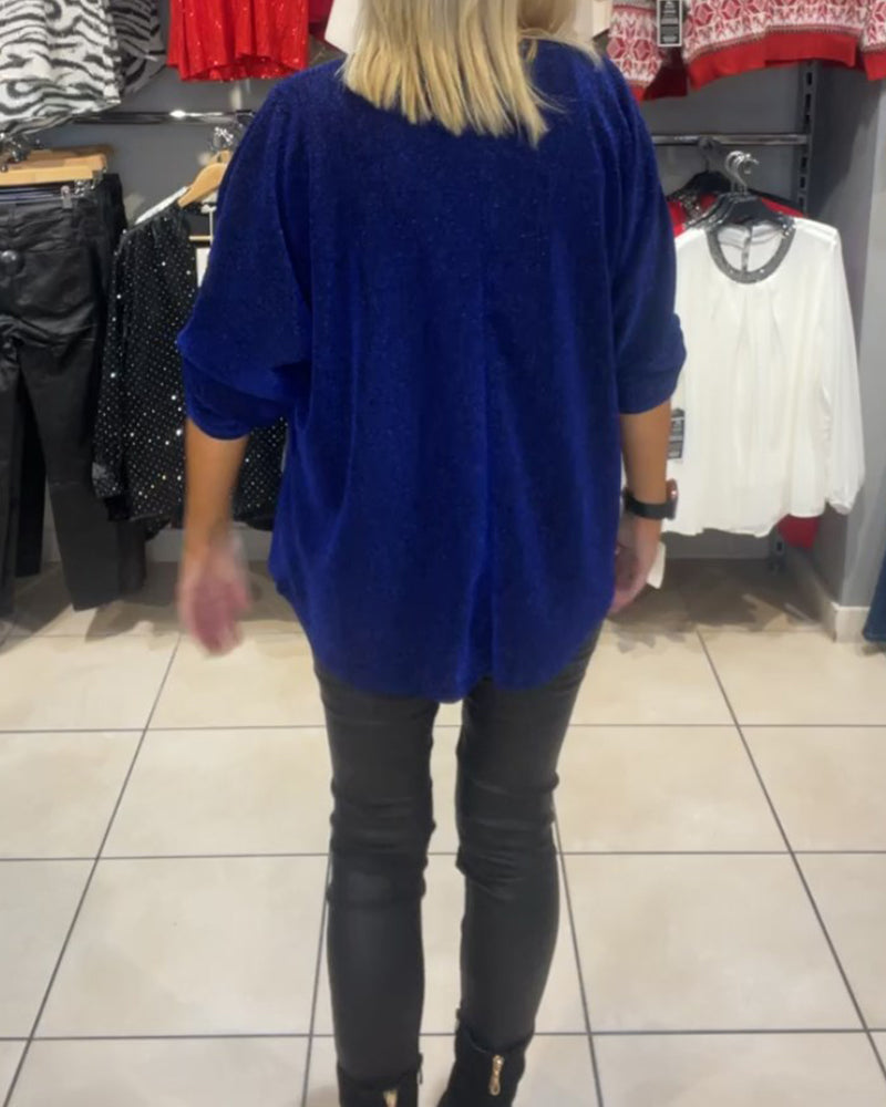 Afslappet top med lange ærmer og lynlås