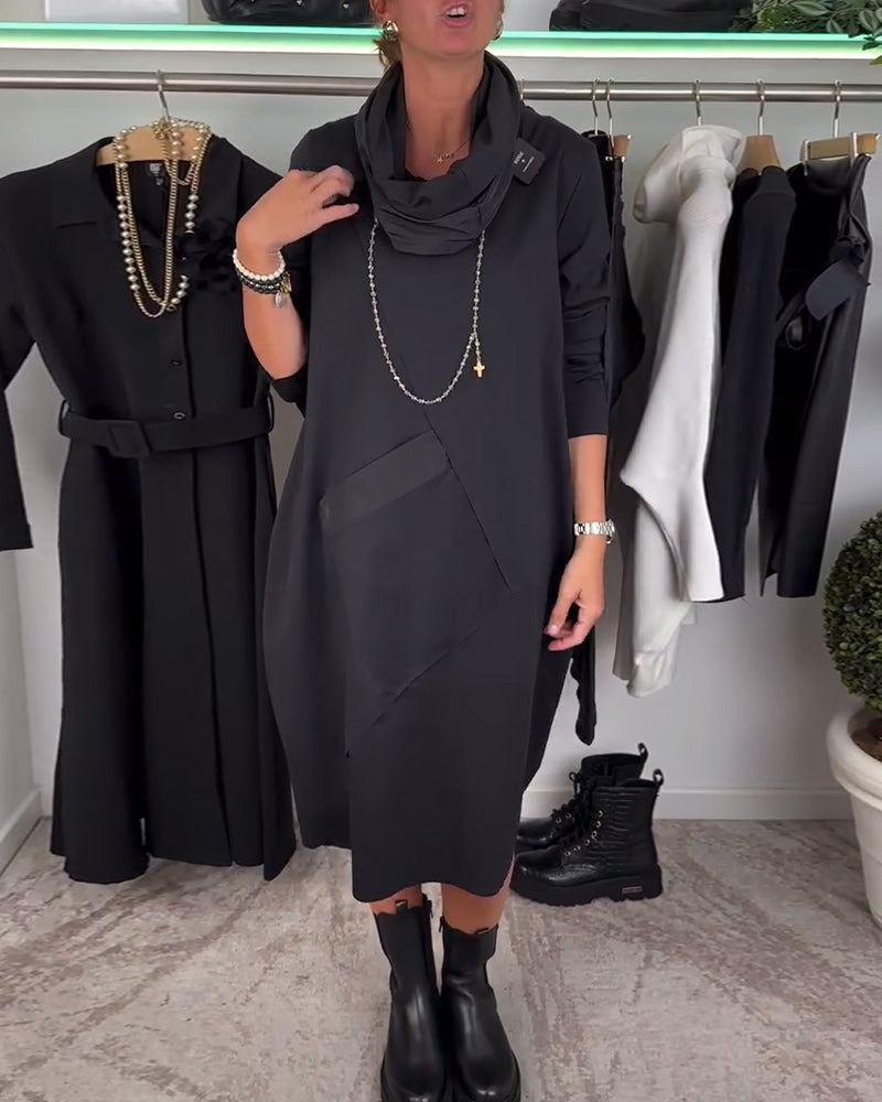 Sort patchwork kjole med stor forlomme