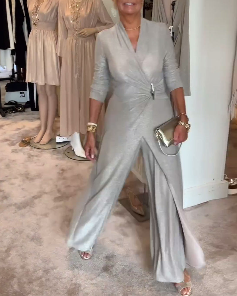 Elegant plisseret sølvfarvet jumpsuit
