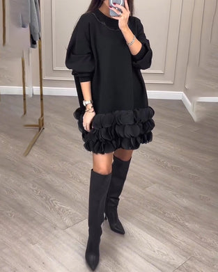 Elegant kjole i kronblade-design