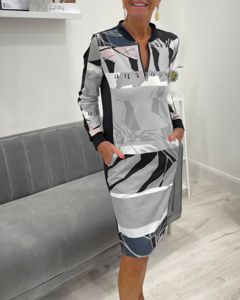 Langærmet kjole med farveblok og lynlås