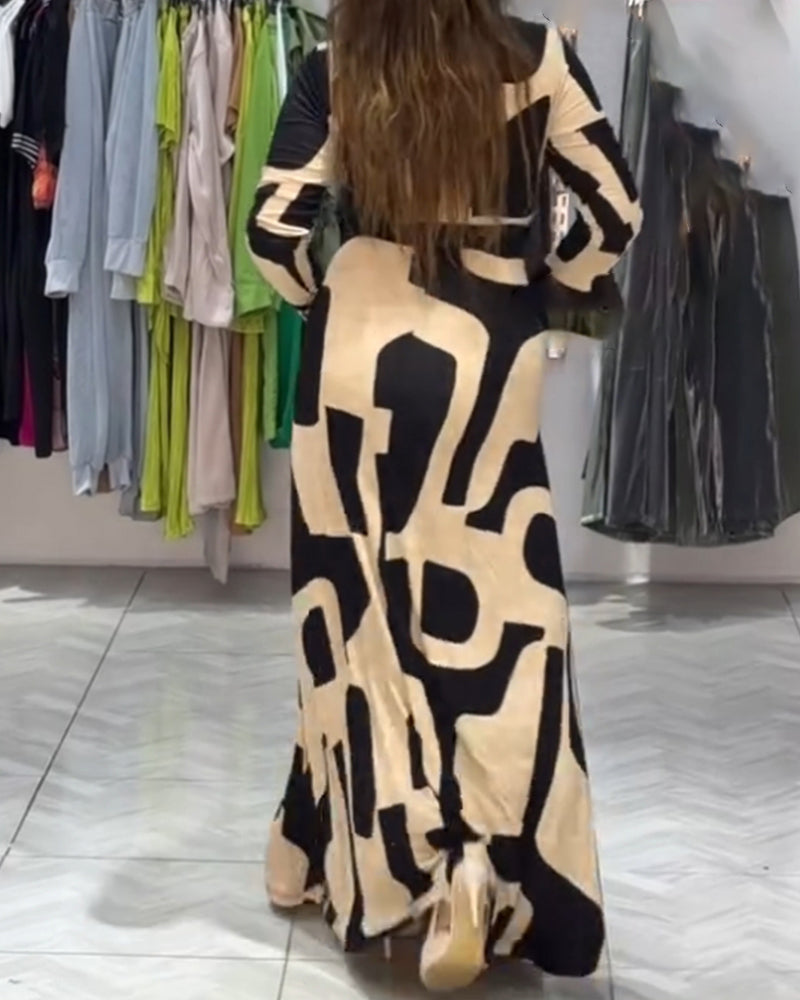 Elegant lang kjole med V-udskæring og print