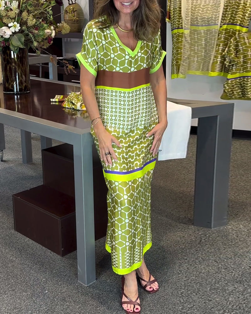 Lang kjole med V-udskæring og kontrastprint