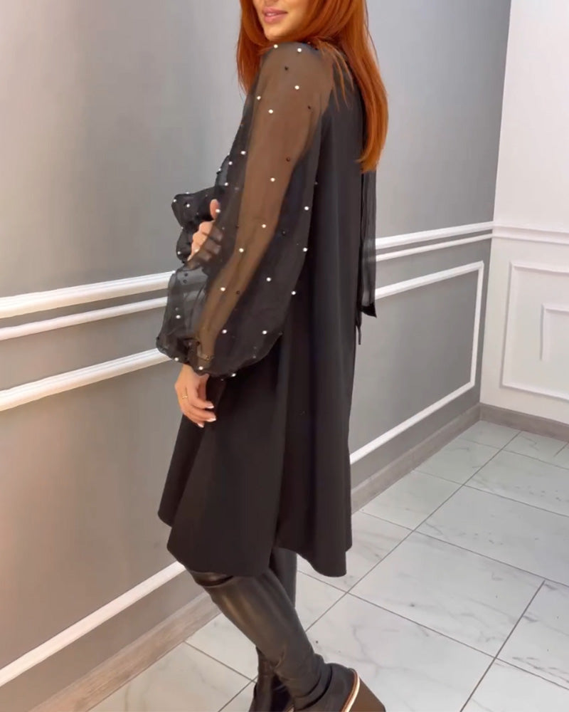 Kjole i løs pasform med mesh ærmer