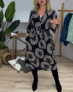 Mønstret kjole med V-udskæring og lange ærmer