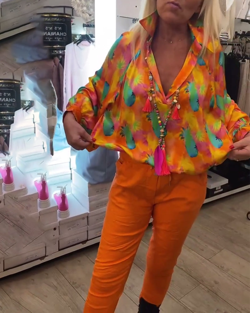 Orange bluse med reverskrave