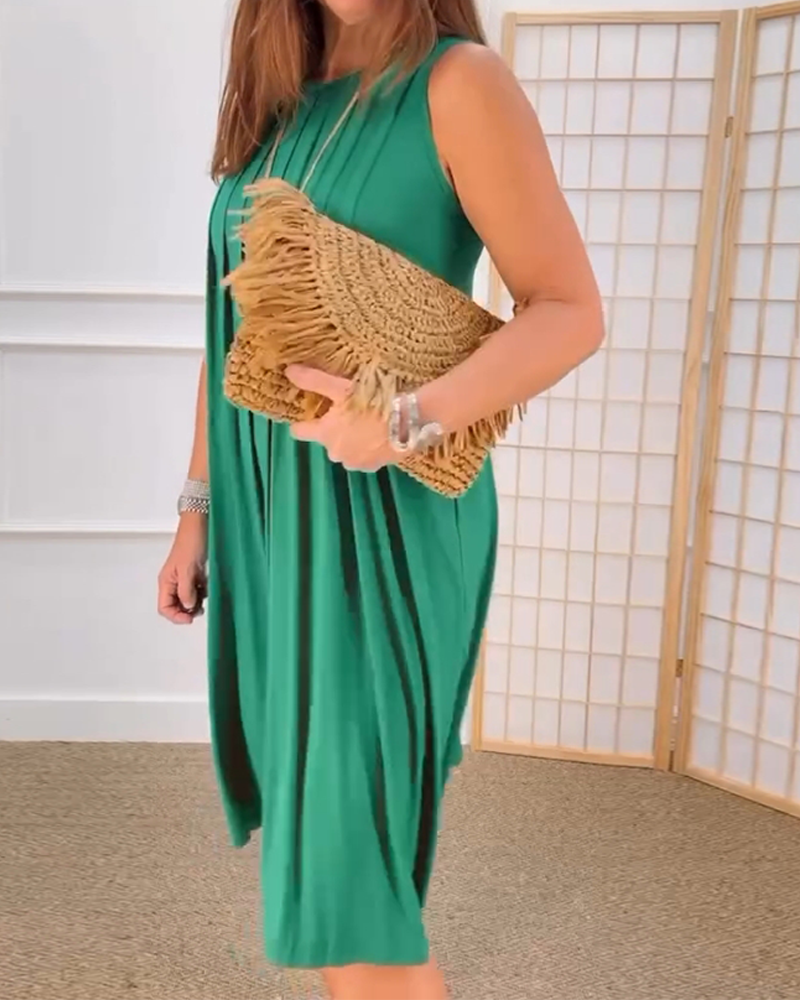 Ærmeløs plisseret kjole med rund hals