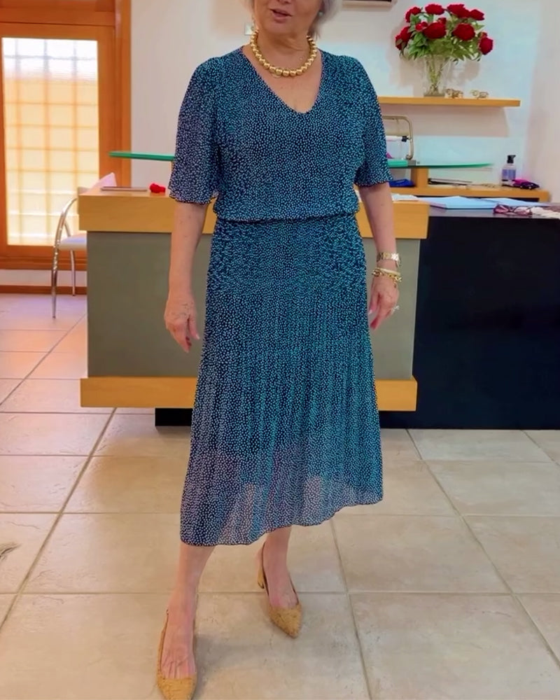 Delvist gennemsigtig kjole med V-udskæring